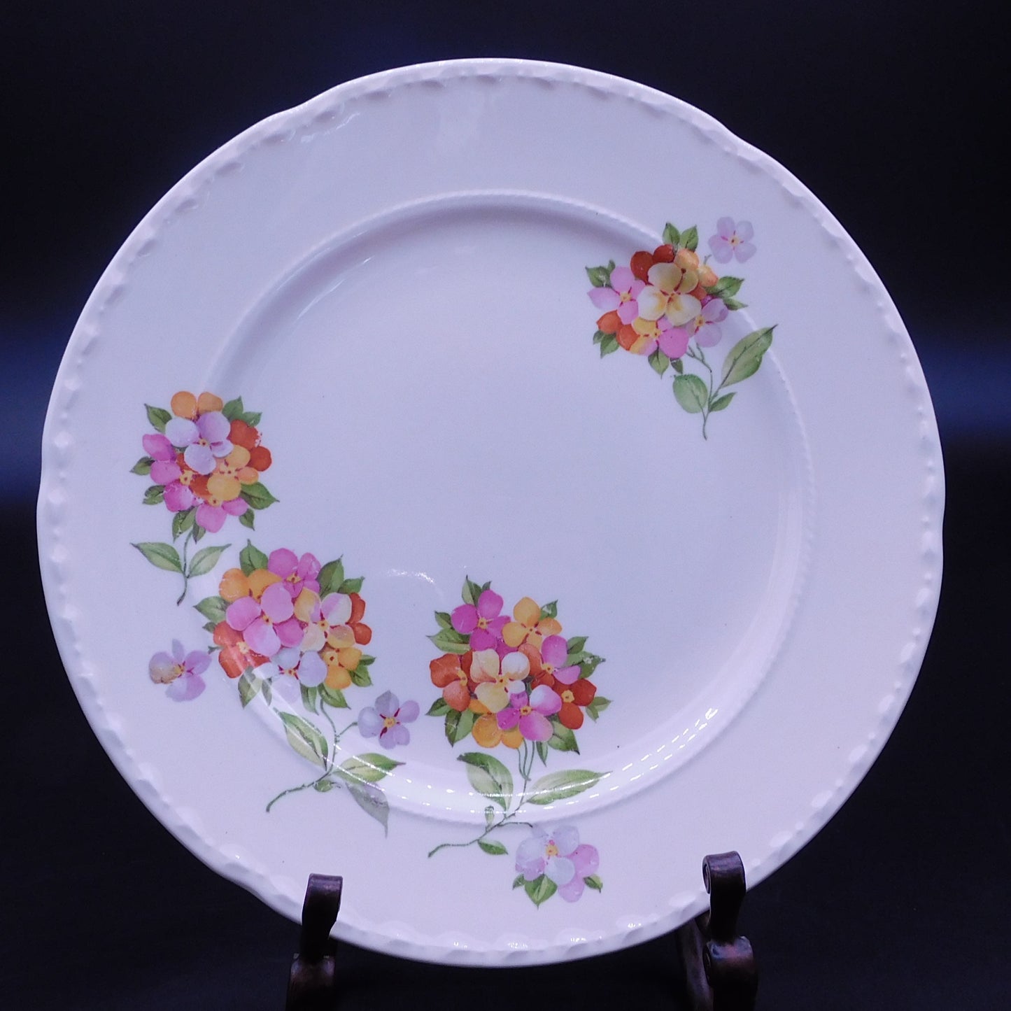 Grace Your Table with Vintage Charm: The Exquisite Jumping Jack Flower Plate by Crooksville China Co. (7174)