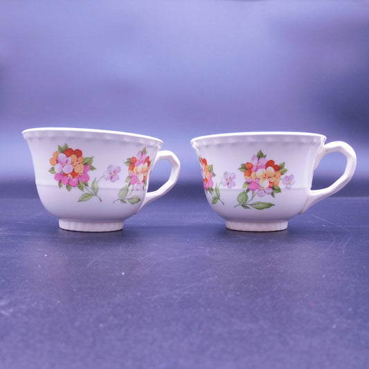 Embrace Elegance: Elevate Your Tea Time with a Teacup Adorned in Vibrant Jumping Jack Flowers (7179)