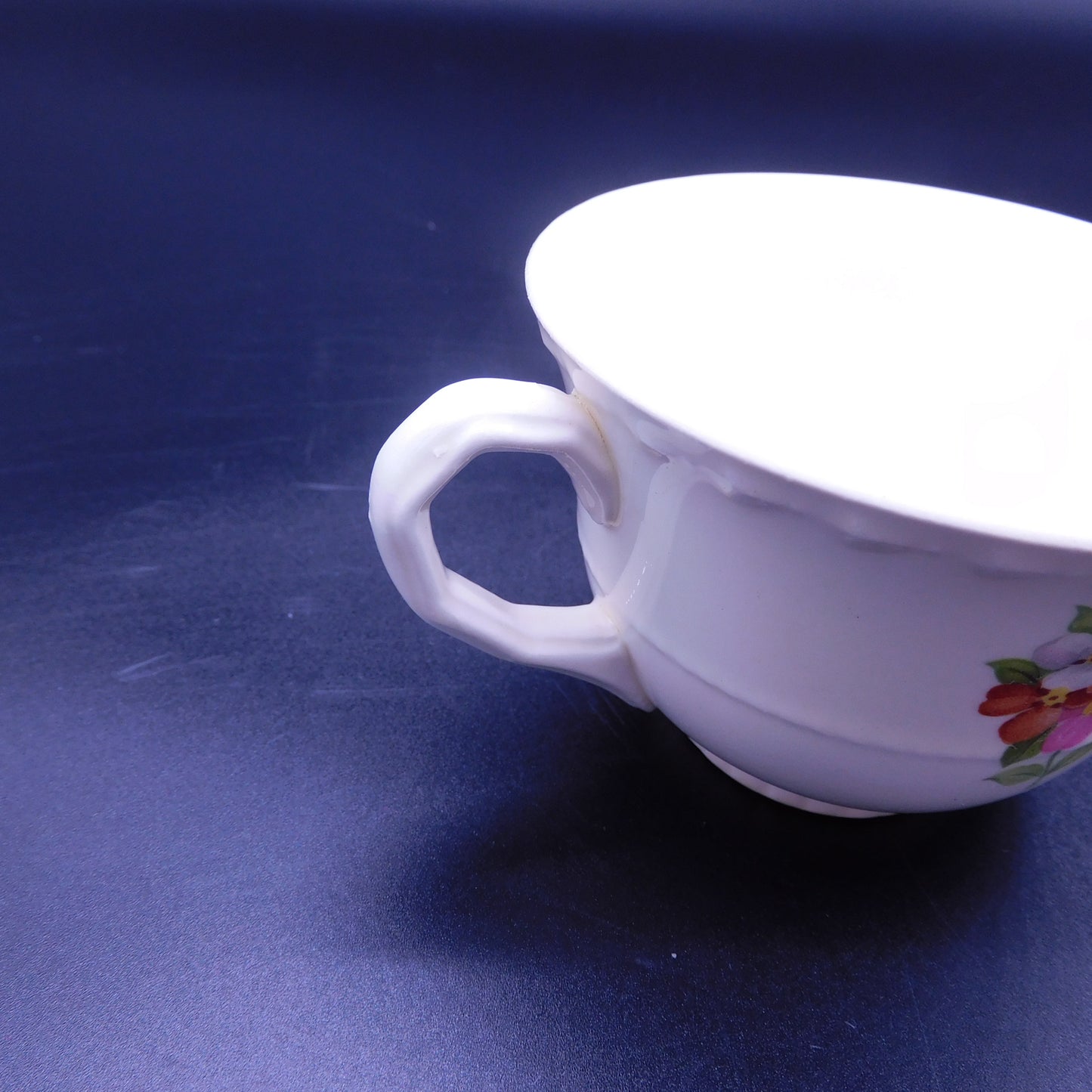 Embrace Elegance: Elevate Your Tea Time with a Teacup Adorned in Vibrant Jumping Jack Flowers (7179)