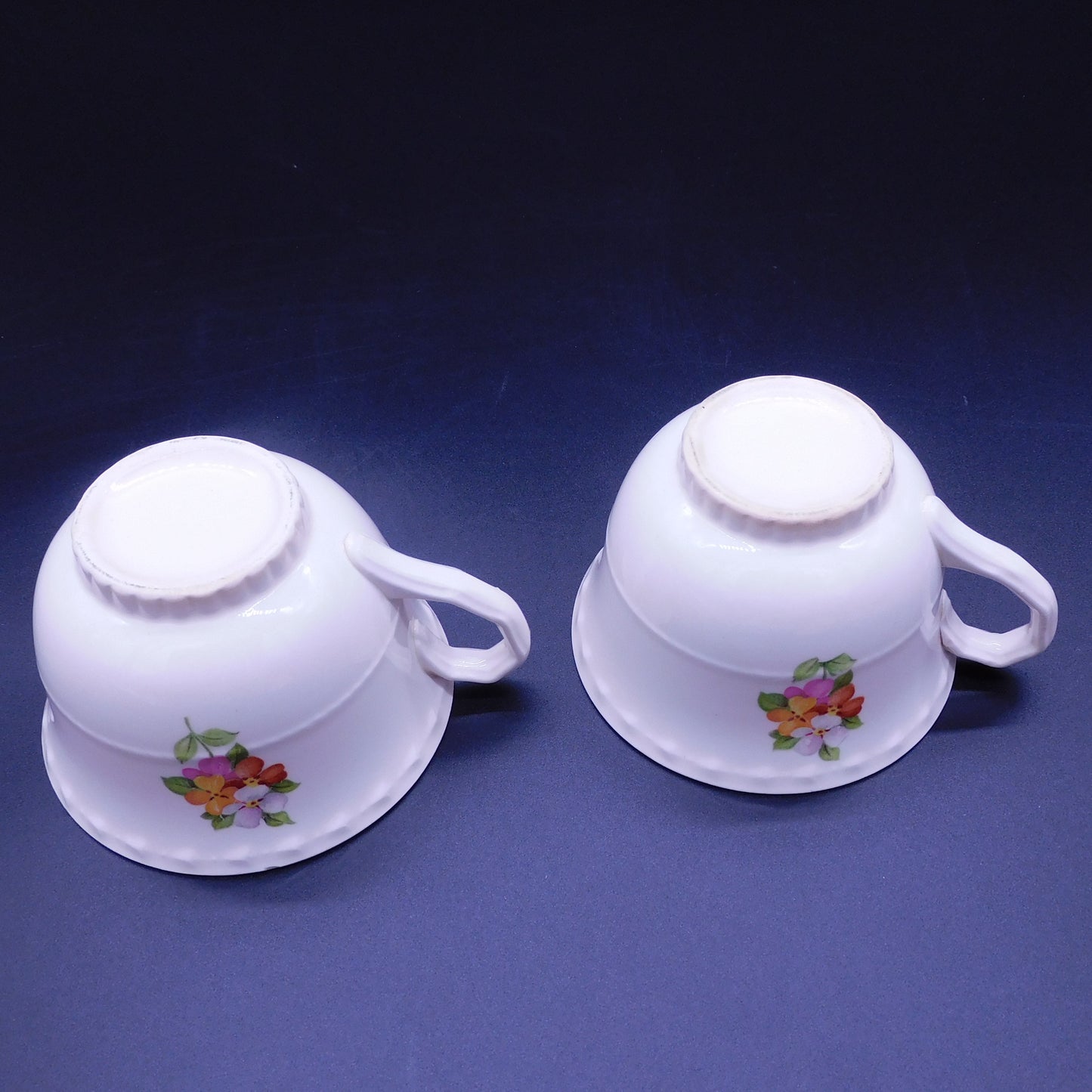 Embrace Elegance: Elevate Your Tea Time with a Teacup Adorned in Vibrant Jumping Jack Flowers (7179)