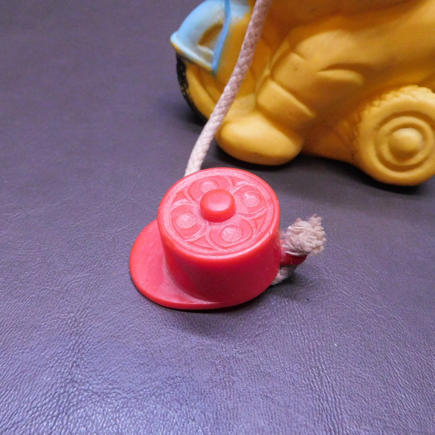 Vintage Yellow Plastic Bear ona Trike, Hat Comes Off with a Hole in Bear to Hold Something 7385