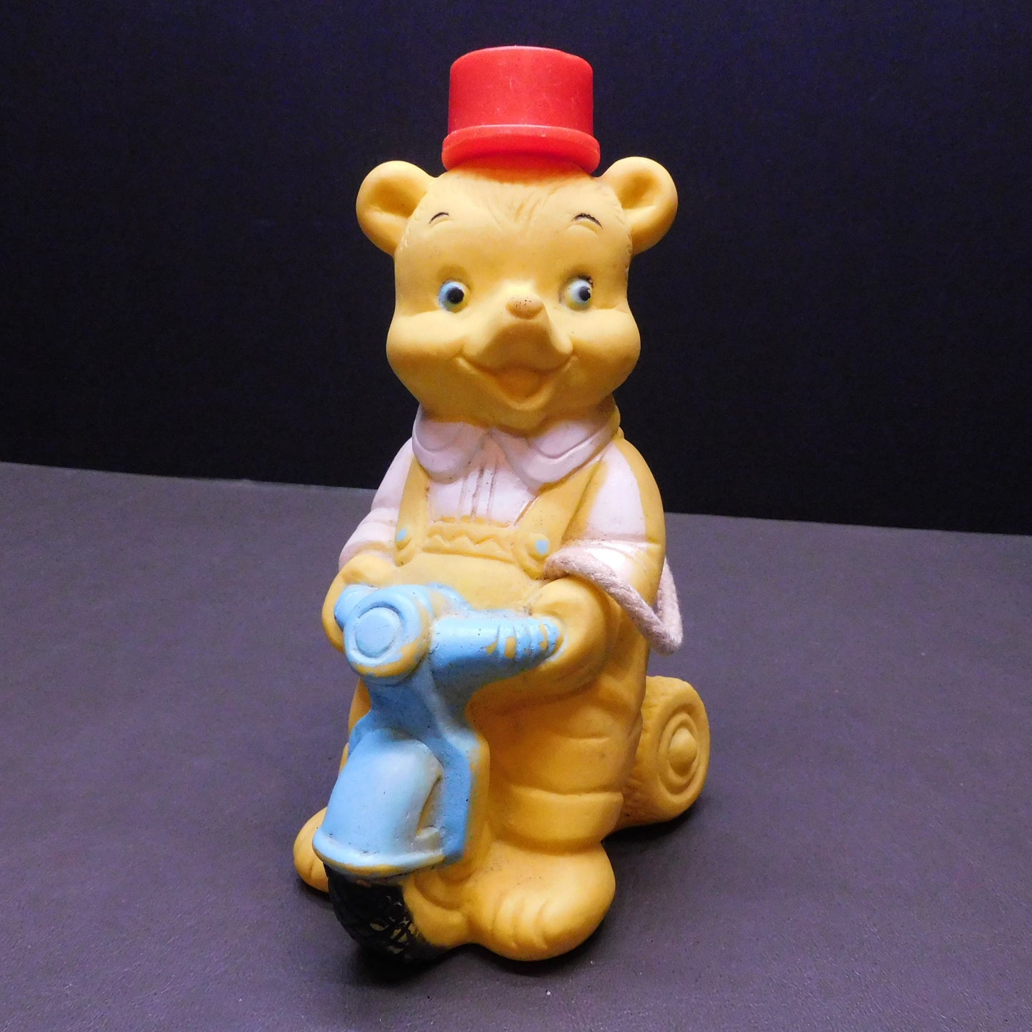 Vintage Yellow Plastic Bear ona Trike, Hat Comes Off with a Hole in Bear to Hold Something 7385