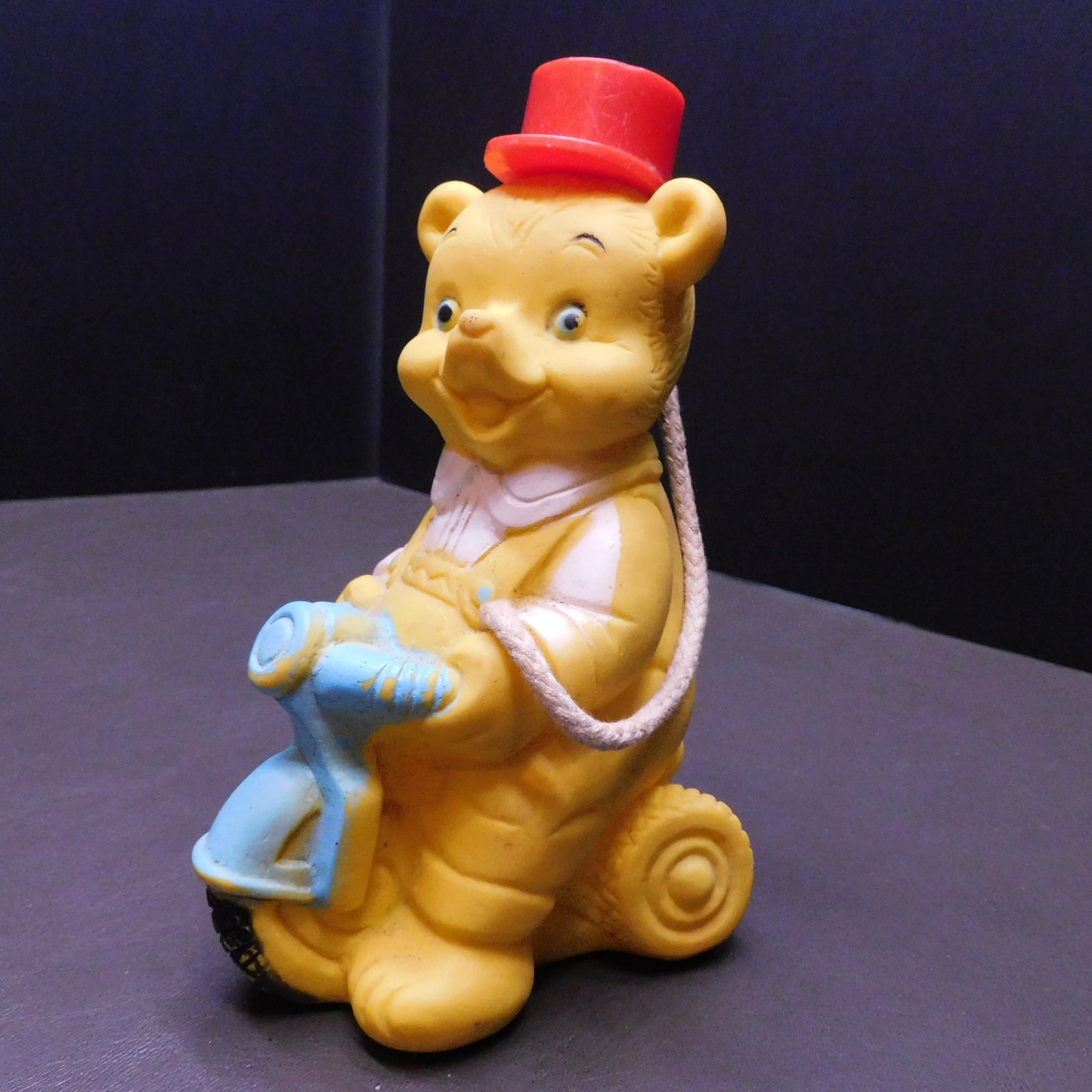 Vintage Yellow Plastic Bear ona Trike, Hat Comes Off with a Hole in Bear to Hold Something 7385