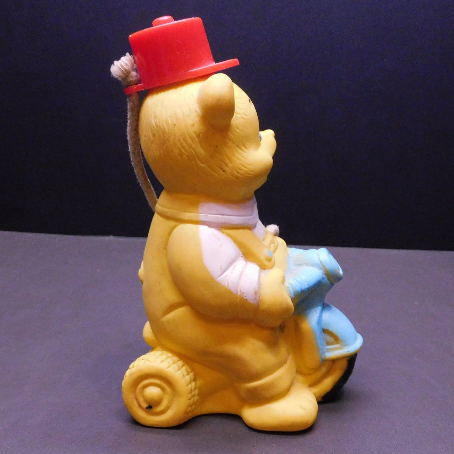 Vintage Yellow Plastic Bear ona Trike, Hat Comes Off with a Hole in Bear to Hold Something 7385