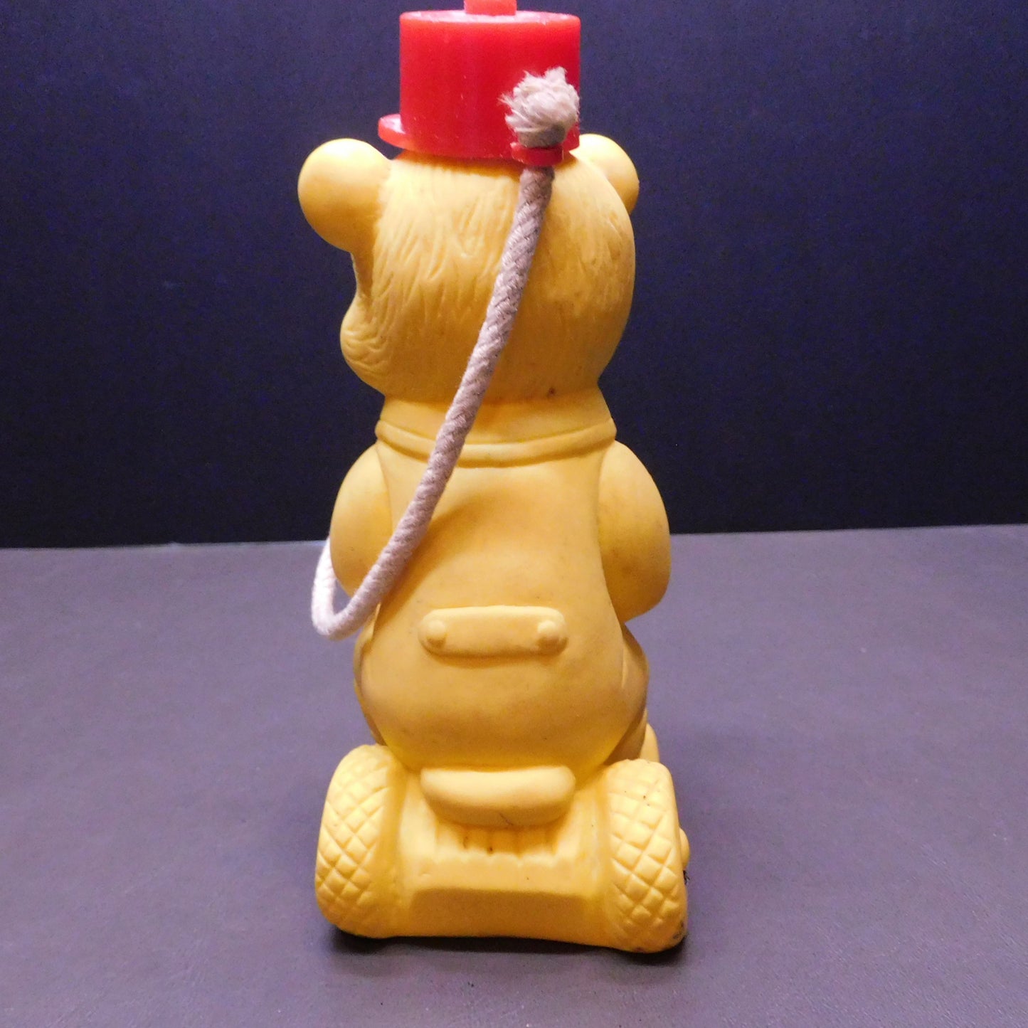 Vintage Yellow Plastic Bear ona Trike, Hat Comes Off with a Hole in Bear to Hold Something 7385