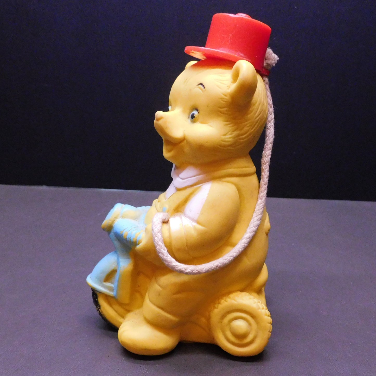 Vintage Yellow Plastic Bear ona Trike, Hat Comes Off with a Hole in Bear to Hold Something 7385